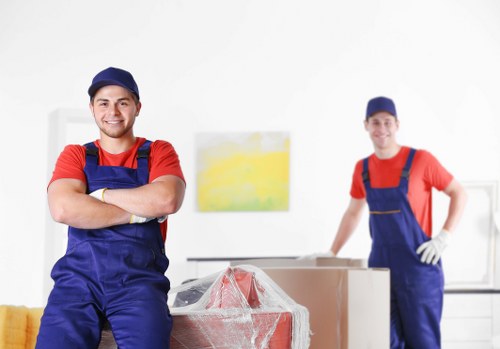 Furniture removals team preparing items in a Fulham residential street