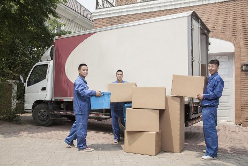 Furniture pick-up service handling a sofa collection in a Fulham flat