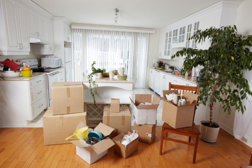 Local moving team handling furniture near Fulham flats and townhouses