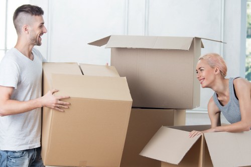 Careful loading of furniture from a Fulham apartment building